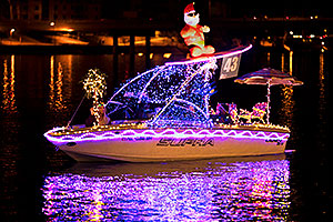 Boat #43 with surfing Santa at APS Fantasy of Lights Boat Parade