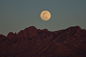 Moon rising by Santa Rita Mountains in Arizona