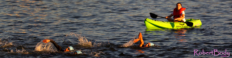 /images/500/2011-10-23-soma-swim-107060sp.jpg - #09664: 00:33:29 Light Blue caps swimming at Soma Triathlon 2011 … October 2011 -- Tempe Town Lake, Tempe, Arizona