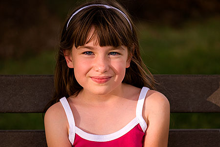 Alexandra on a bench in the park 
