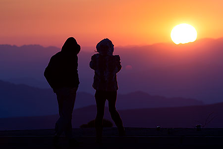 People Silhouettes at sunrise in Death Valley 