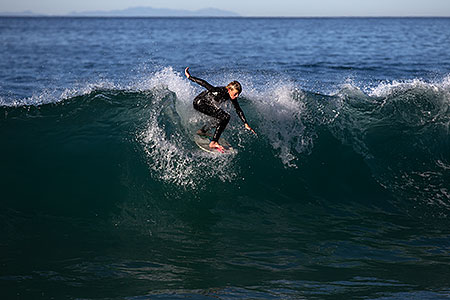 Skimboarders at Aliso Beach, California 