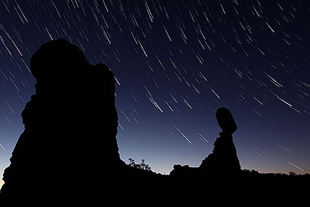 22 minutes of star trails at Balanced Rock in Arches National Park at sunrise 