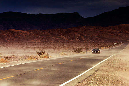 Wind and dust on the road in Death Valley 